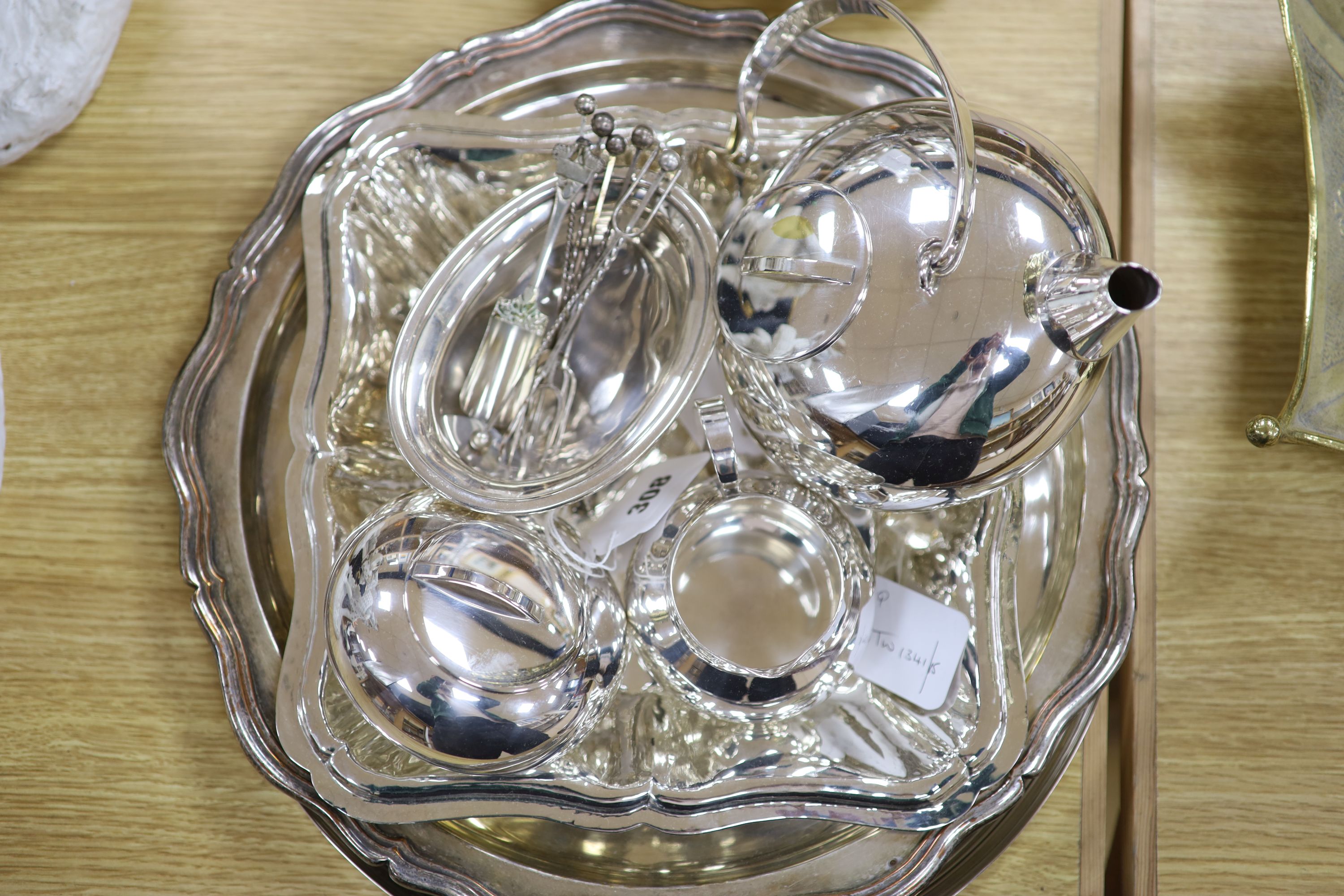 A Christofle Art Deco plated three-piece teaset and tray (pot handle a.f.) and sundry plated items,